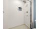 Shower with white tiles and a built-in niche, featuring a showerhead at 2510 Laurelwood Dr # 5B, Clearwater, FL 33763