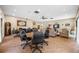 Community lounge with a seating area and tables for relaxation and social gatherings at 2928 Feather Dr, Clearwater, FL 33759