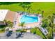 An aerial shot of the pool highlighting the lounge chairs and palms at 2928 Feather Dr, Clearwater, FL 33759