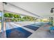 Covered shuffleboard court in a community setting, offering a fun recreational activity at 2928 Feather Dr, Clearwater, FL 33759
