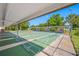 Inviting shuffleboard area with multiple courts and shaded seating, perfect for community enjoyment at 2928 Feather Dr, Clearwater, FL 33759