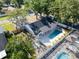 Aerial view of home with swimming pool in backyard with mature trees at 3202 Cullendale Dr, Tampa, FL 33618