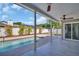 Covered back porch and swimming pool offer an ideal outdoor living and entertaining space at 3202 Cullendale Dr, Tampa, FL 33618