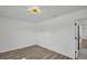 Bedroom showcasing recessed lights and clean, neutral colors, wood floors, and natural light at 3202 Cullendale Dr, Tampa, FL 33618