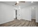 Bedroom with wood floors, modern fan and recessed lighting at 3202 Cullendale Dr, Tampa, FL 33618