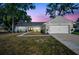 Charming single-story home boasts a well-manicured lawn, inviting entrance and a two-car garage at 3202 Cullendale Dr, Tampa, FL 33618