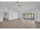 Bright living space featuring sliding glass doors that offer a view of the outdoor pool area and lots of light at 3202 Cullendale Dr, Tampa, FL 33618
