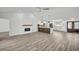 Spacious living room connects seamlessly to the kitchen, boasting a fireplace and lots of natural light at 3202 Cullendale Dr, Tampa, FL 33618