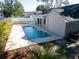 A refreshing pool with a concrete deck offers a backyard oasis for relaxation and recreation at 3202 Cullendale Dr, Tampa, FL 33618