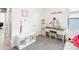Charming bedroom with a vanity, dresser, and plush carpeting at 33716 Elm Hill Br, Wesley Chapel, FL 33545