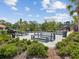 Community grilling area with multiple grills, picnic tables, and landscaping at 33716 Elm Hill Br, Wesley Chapel, FL 33545