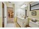 Bathroom featuring a vanity with countertop storage space and a toilet at 3476 Tarpon Woods Blvd, Palm Harbor, FL 34685
