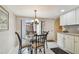 Eat in kitchen area with sliding doors that lead out to the patio at 3476 Tarpon Woods Blvd, Palm Harbor, FL 34685