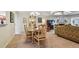 View of the dining room from another angle showing proximity to the living room at 3476 Tarpon Woods Blvd, Palm Harbor, FL 34685