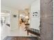 Inviting foyer featuring tile flooring, neutral tones, and an open entryway at 3476 Tarpon Woods Blvd, Palm Harbor, FL 34685