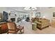Spacious and cozy living room with a fireplace and modern furnishings at 3476 Tarpon Woods Blvd, Palm Harbor, FL 34685