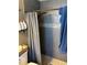 Bathroom offering a shower with a gray curtain, tile, and a mounted shower head at 3612 Devonshire Dr, Holiday, FL 34691