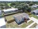 Well-maintained property featuring a fenced yard and a cozy home with inviting wooden steps and decks at 3924 Kiah Dr, Wesley Chapel, FL 33543