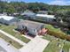 Property featuring matching wood decks and steps, offering a welcoming entrance and outdoor living space at 3924 Kiah Dr, Wesley Chapel, FL 33543