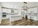 Bright, modern kitchen with white cabinetry, stainless steel appliances, and a large center island at 4115 N Blvd, Tampa, FL 33603