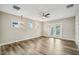 Spacious living room featuring hardwood floors and natural light at 4115 N Blvd, Tampa, FL 33603