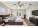 Primary bedroom featuring French doors and hardwood floors at 4115 N Blvd, Tampa, FL 33603