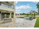 Backyard featuring a spacious pool area, patio, and a well-manicured lawn at 4115 N Blvd, Tampa, FL 33603