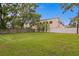 Large backyard with lawn and fences at 4121 W San Nicholas St, Tampa, FL 33629