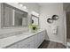 Bright bathroom with dual vanity, granite countertops and modern fixtures at 4121 W San Nicholas St, Tampa, FL 33629