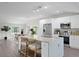Modern kitchen with stainless steel appliances, granite countertops, and an island with seating at 4121 W San Nicholas St, Tampa, FL 33629