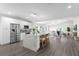 Spacious open-concept kitchen with stainless steel appliances, breakfast bar, island, and modern fixtures, great for entertaining at 4121 W San Nicholas St, Tampa, FL 33629