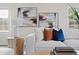 Comfortable living room featuring stylish decor, a plush sofa, and contemporary artwork at 4121 W San Nicholas St, Tampa, FL 33629