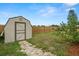Backyard with a shed for extra storage space at 4150 Pecos Dr, New Port Richey, FL 34653