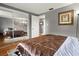 Bedroom features a large closet with mirror sliding doors and gray walls at 4150 Pecos Dr, New Port Richey, FL 34653