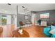 Spacious living room boasting hardwood floors, stylish decor, and an inviting atmosphere at 4150 Pecos Dr, New Port Richey, FL 34653