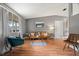 Bright living room with hardwood floors, comfortable seating, and stylish accents at 4150 Pecos Dr, New Port Richey, FL 34653
