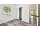 Bedroom with closet, one window, and gray floors at 4461 Shore Acres Ne Blvd, St Petersburg, FL 33703