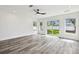 Living room with recessed lighting and access to the backyard at 4461 Shore Acres Ne Blvd, St Petersburg, FL 33703