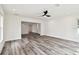 Open living space featuring modern ceiling fan and access to other rooms at 4461 Shore Acres Ne Blvd, St Petersburg, FL 33703