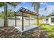 Nicely constructed backyard pergola with shade cover, perfect for outdoor entertaining at 4461 Shore Acres Ne Blvd, St Petersburg, FL 33703
