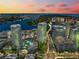 Stunning aerial view of waterfront high-rise buildings with a picturesque river and ocean at sunset at 449 S 12Th St # 1201, Tampa, FL 33602