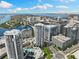 Breathtaking aerial view of luxury high-rise buildings with a river, ocean, and city skyline in the background at 449 S 12Th St # 1201, Tampa, FL 33602