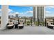 Spacious balcony with city views, furnished with comfortable seating at 449 S 12Th St # 1201, Tampa, FL 33602