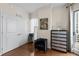 Bedroom featuring a dresser, chair, closet and wood floor at 449 S 12Th St # 1201, Tampa, FL 33602