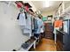 Walk-in closet offering ample storage solutions, including shelves, hanging rods, and drawers at 449 S 12Th St # 1201, Tampa, FL 33602