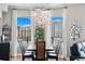 Condo dining area with modern light fixture and city view at 449 S 12Th St # 1201, Tampa, FL 33602