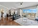Elegant living room featuring hardwood floors, stylish furnishings, and panoramic city views at 449 S 12Th St # 1201, Tampa, FL 33602