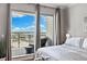 Bright bedroom with balcony overlooking the city and distant bay views at 449 S 12Th St # 1201, Tampa, FL 33602