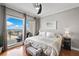 Relaxing main bedroom with balcony access offering beautiful views of the surrounding cityscape at 449 S 12Th St # 1201, Tampa, FL 33602