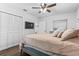 Cozy bedroom featuring a comfortable bed, closet, and neutral decor, perfect for relaxation at 4531 7Th N Ave, St Petersburg, FL 33713